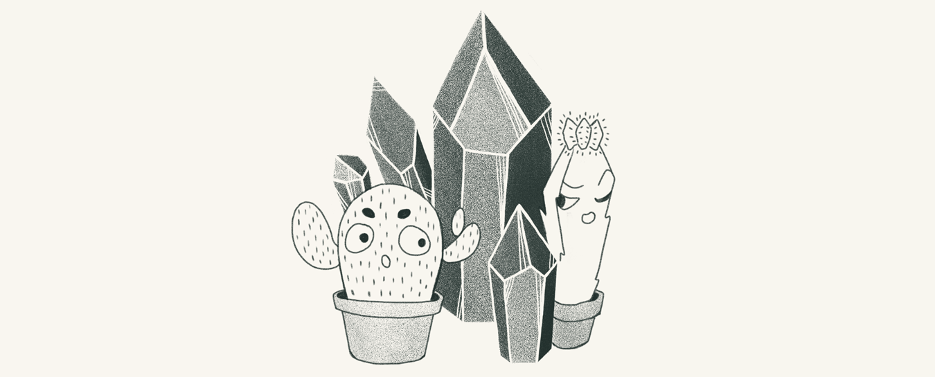 Two cactus characters among some large crystals.